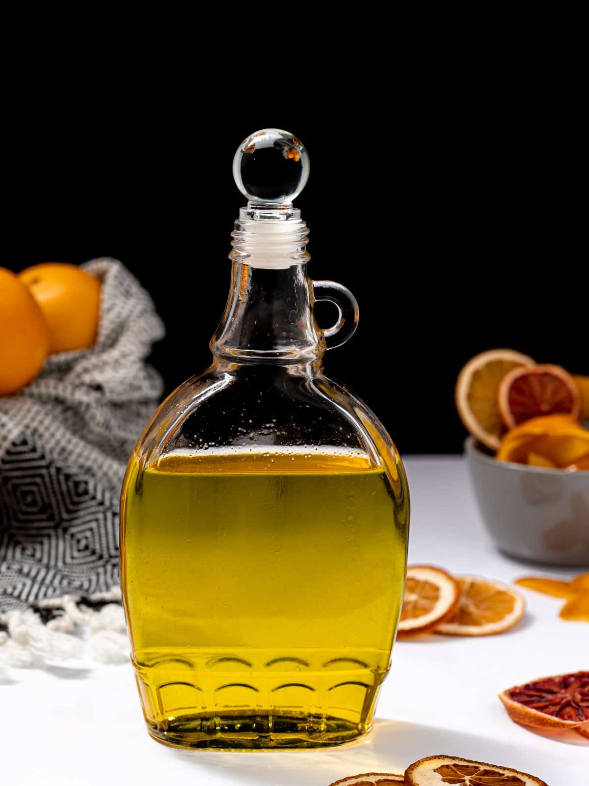 bottle of orange simple syrup