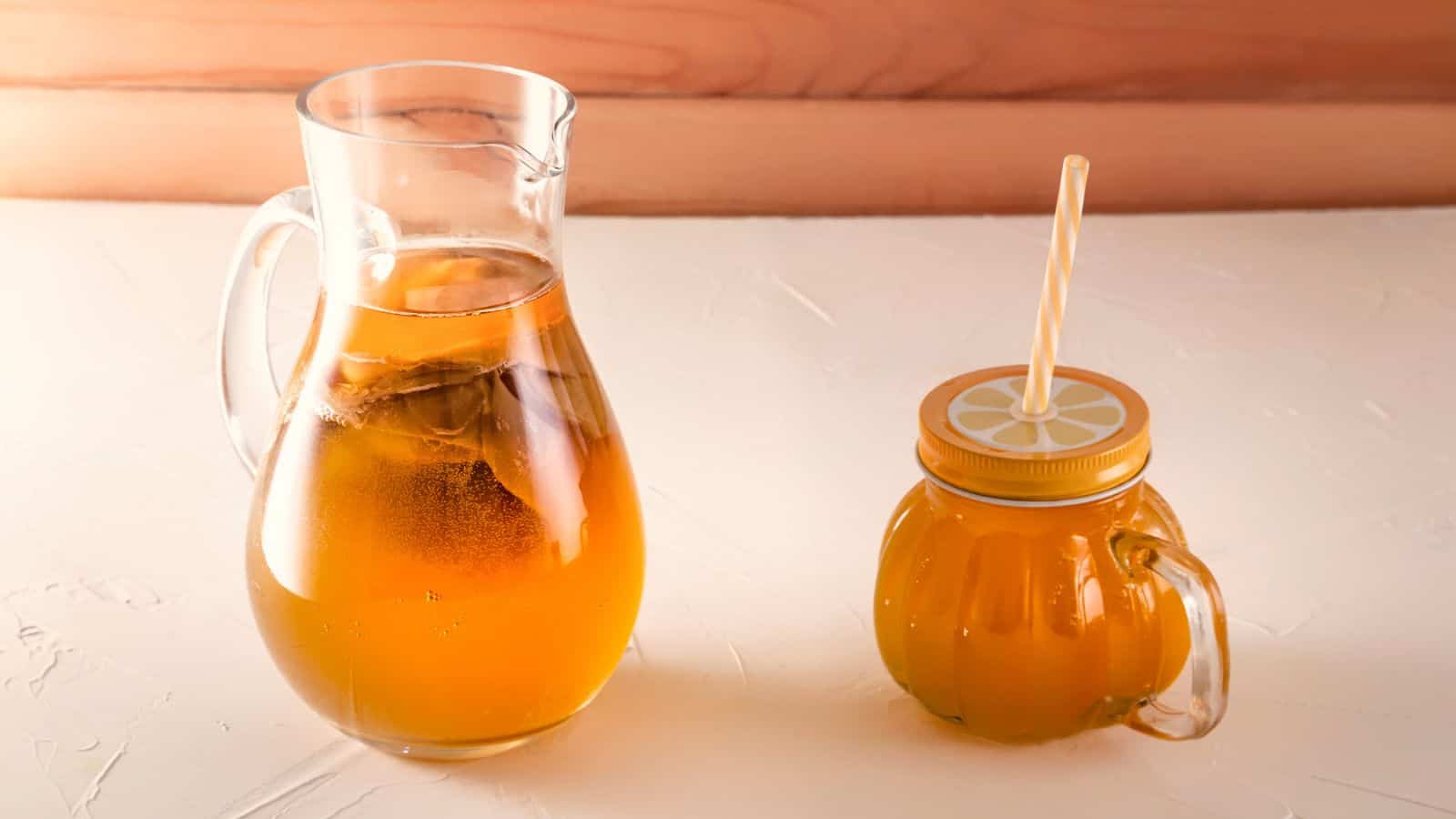 A pitcher and a glass of jun