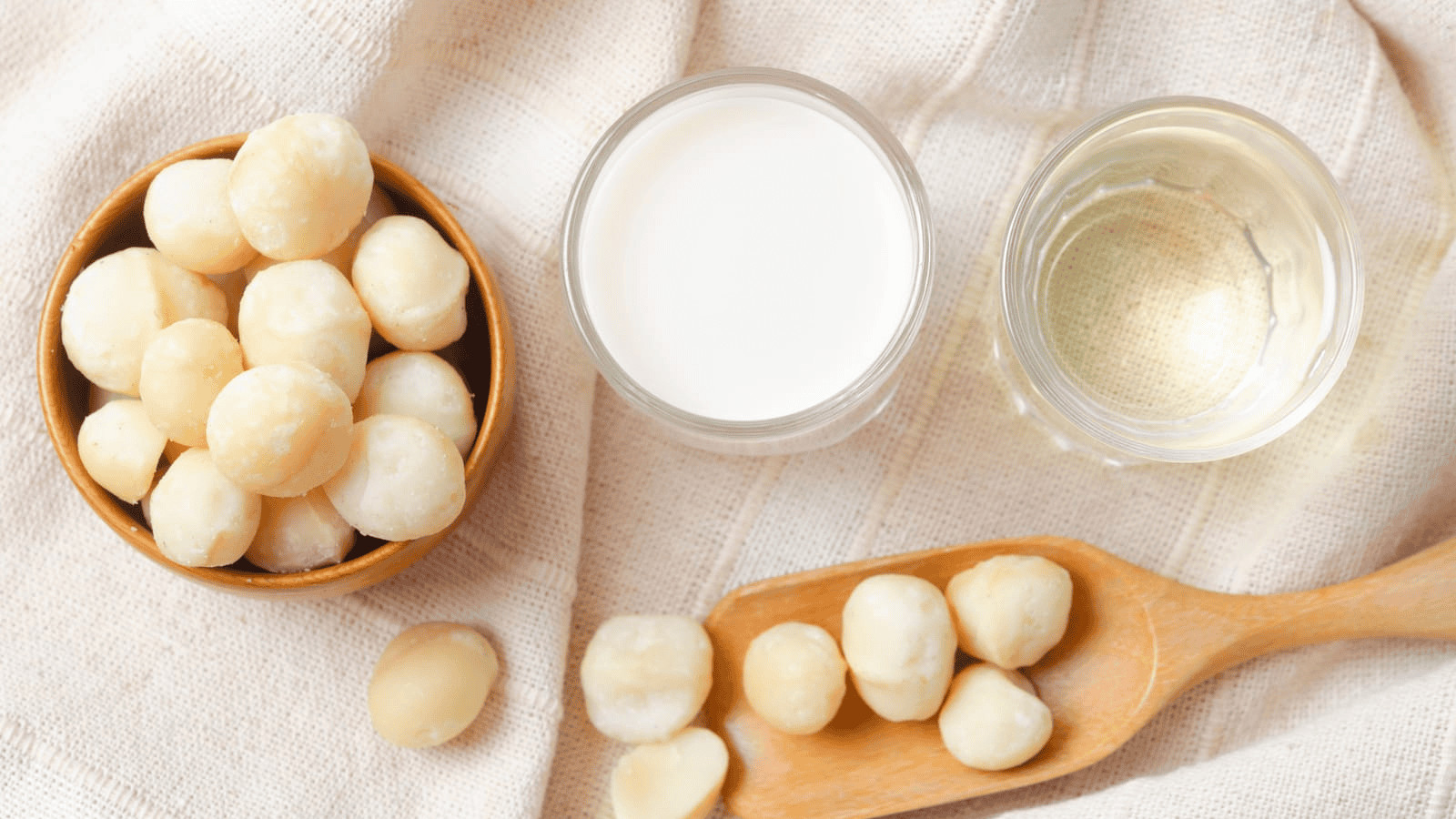 A bowl of food accompanied by a refreshing glass of plant-based dairy milk substitutes.