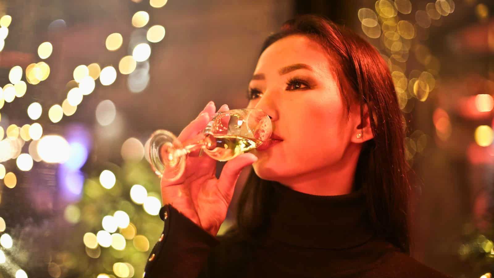Woman drinking champagne from a glass