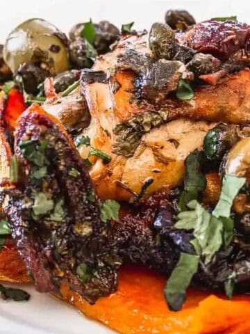 chicken thigh on plate.