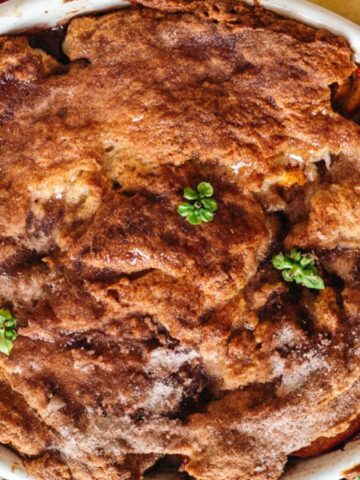 close up on basil peach cobbler