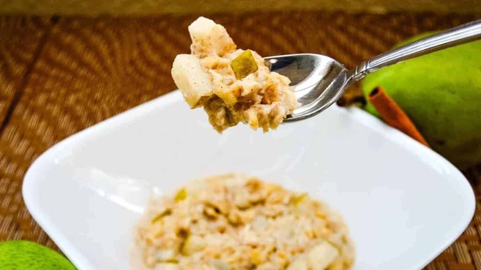 Spiced pear cobbler scooped by a spoon