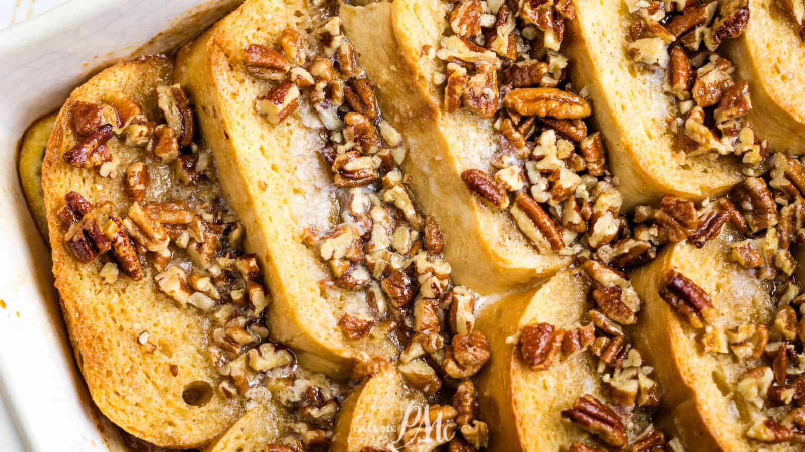French toast casserole with pecans in a baking dish.