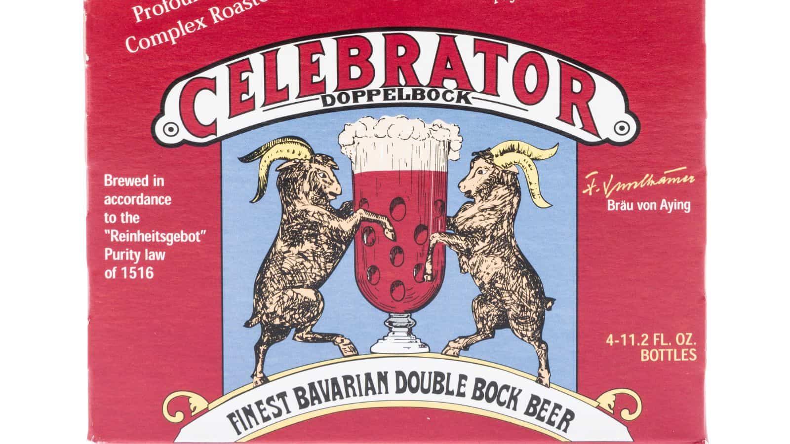 The image shows a beer label for Celebrator Doppelbock. It features two goats standing on hind legs, facing each other with a large beer glass between them. The text describes it as "Finest Bavarian Double Bock Beer" with a reference to the Purity Law of 1516.