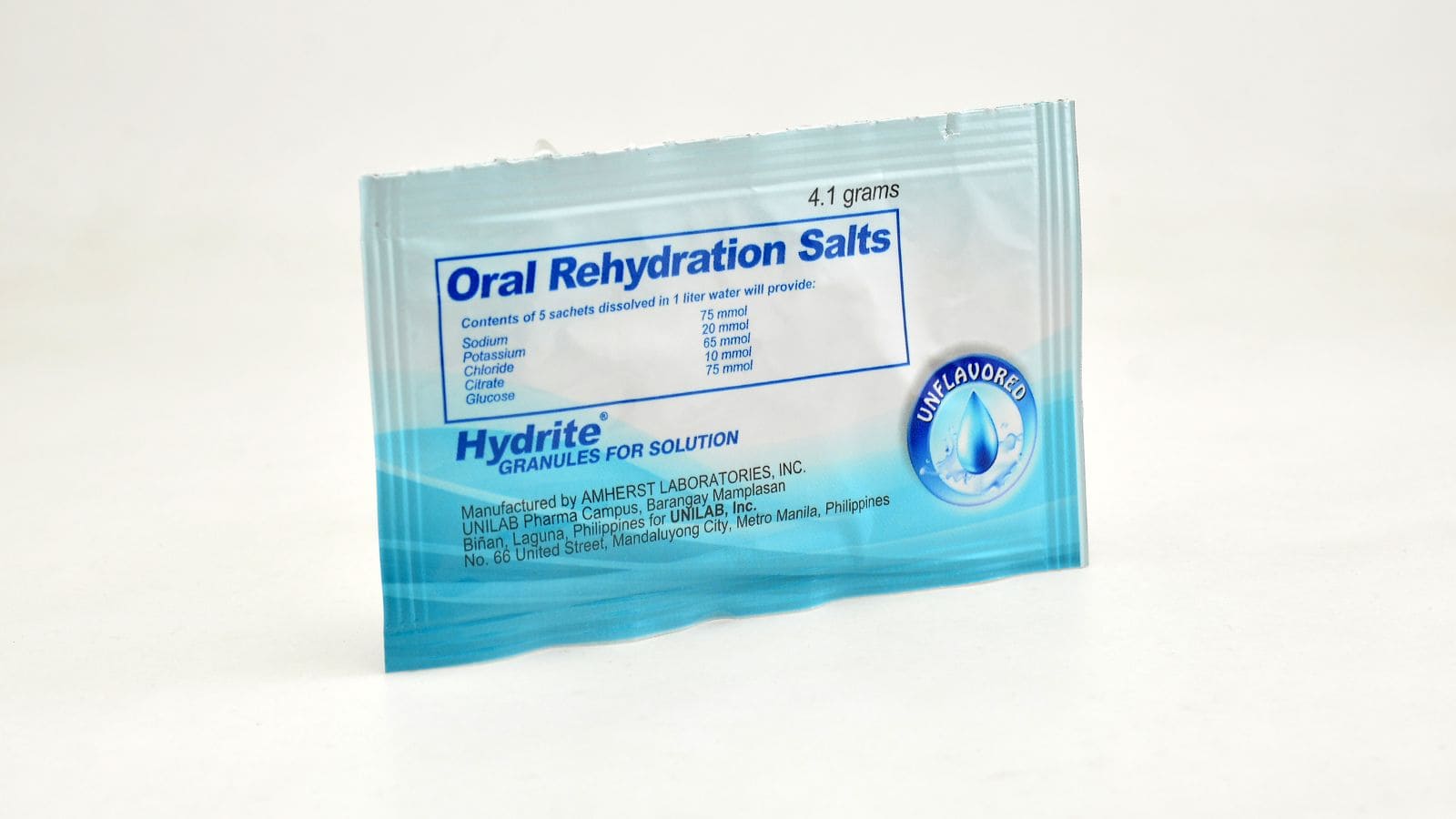 A sachet labeled "Oral Rehydration Salts" for solution preparation, showing it is unflavored and weighs 4.1 grams. The packaging lists the ingredients and manufacturer’s information.