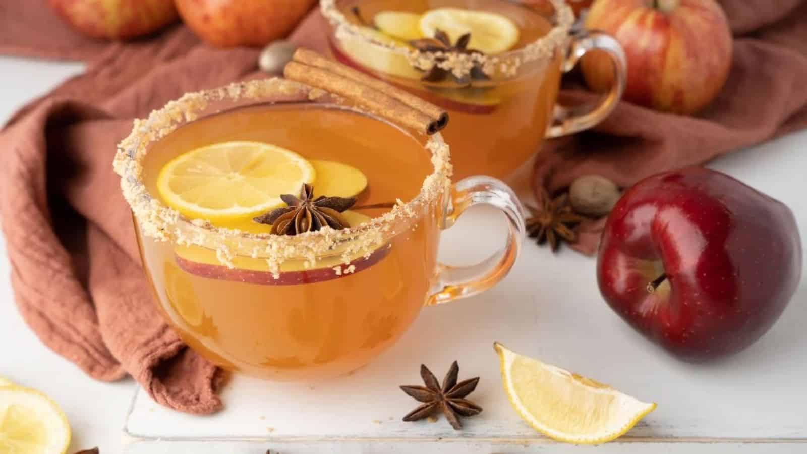 A mug of toffee apple cider fireball hot toddy.