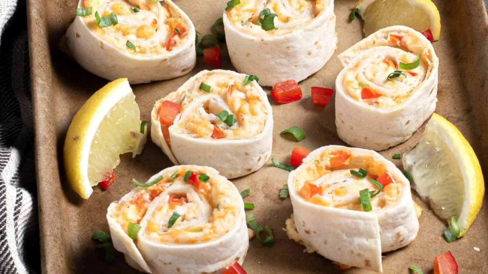 Crab pinwheels filled with a creamy crab mixture and sliced into bite-sized rounds.