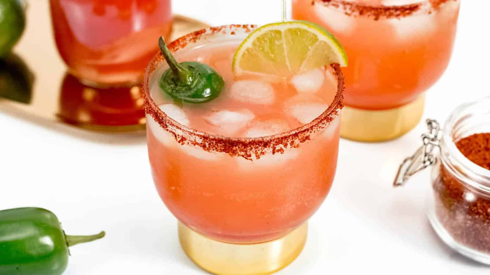 Vampiro cocktail served in a glass with a colorful red drink.